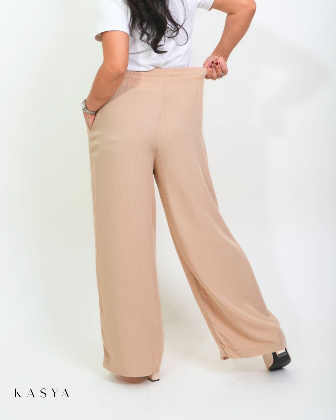Beige wide-leg pants, back view