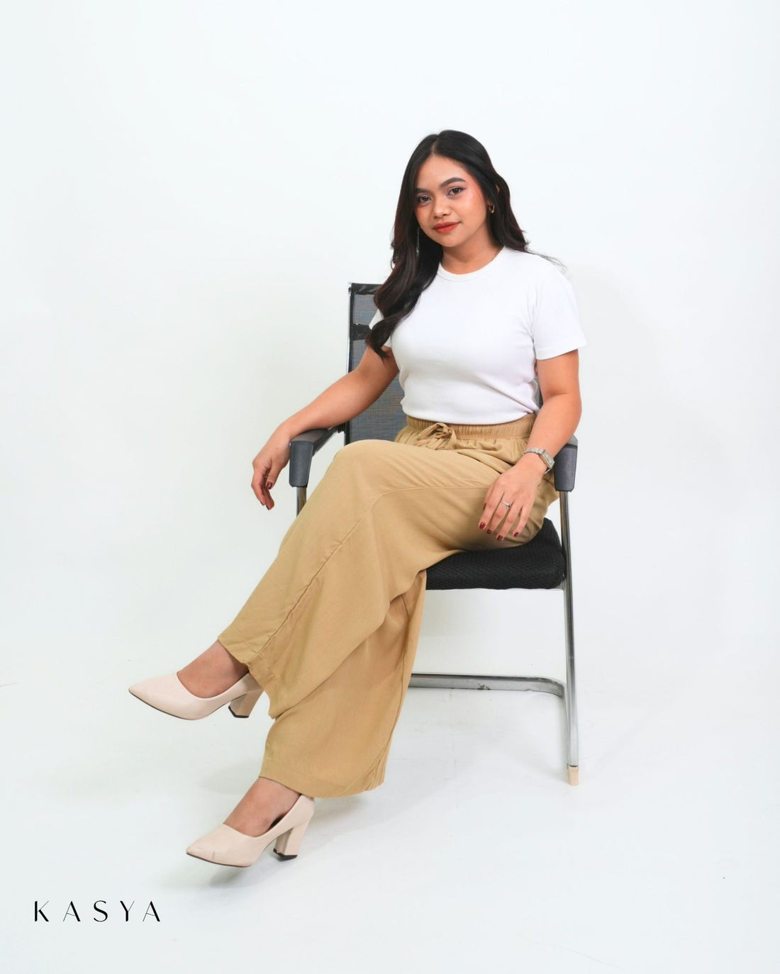 Khaki wide-leg pants, sitting view